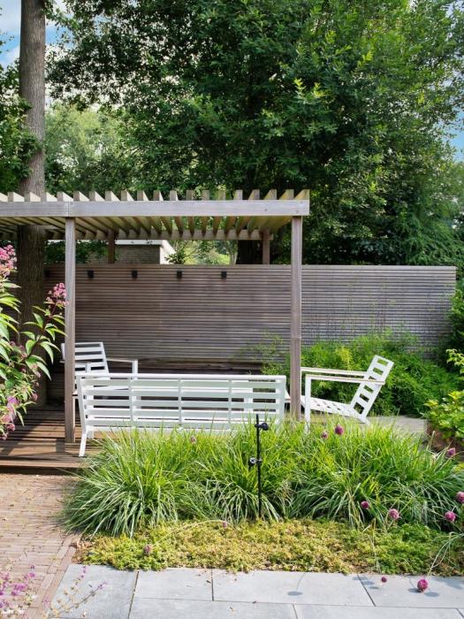 luxe tuin met overkapping