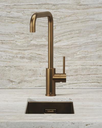 Strakke bronzen mengkraan met naadloos geïntegreerde spoelbak