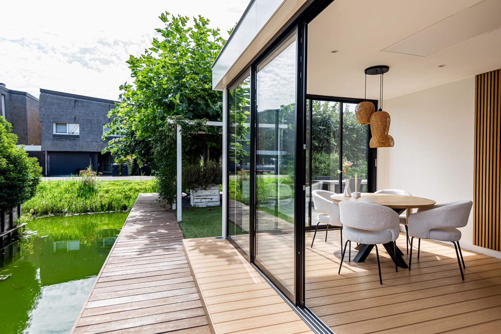 tuinkamer met glazen vouwwanden