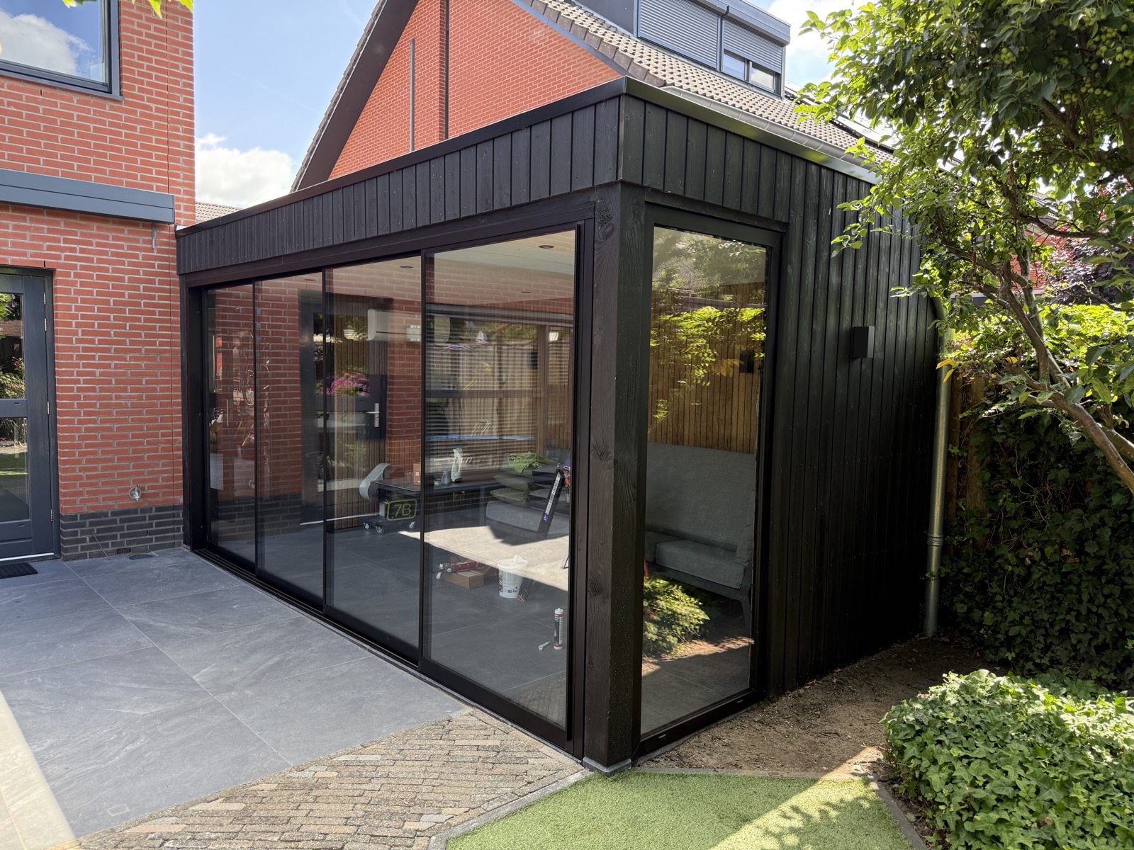 tuinkamer met maatwerk schuifwanden