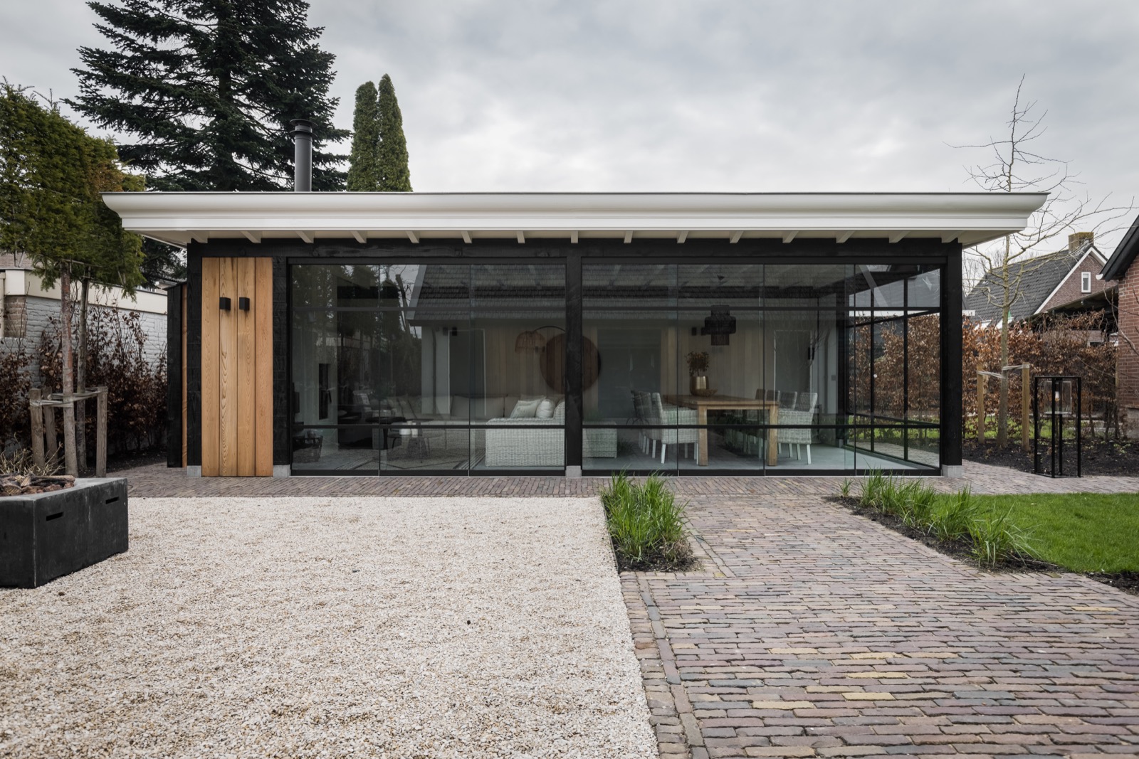 terrasoverkapping met glazen schuifdeuren