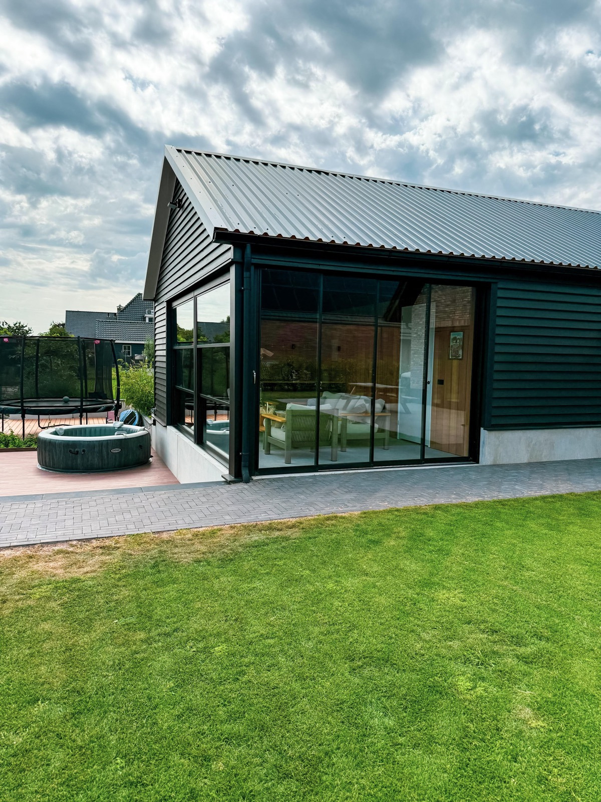 tuinkamer met glazenwandsysteem