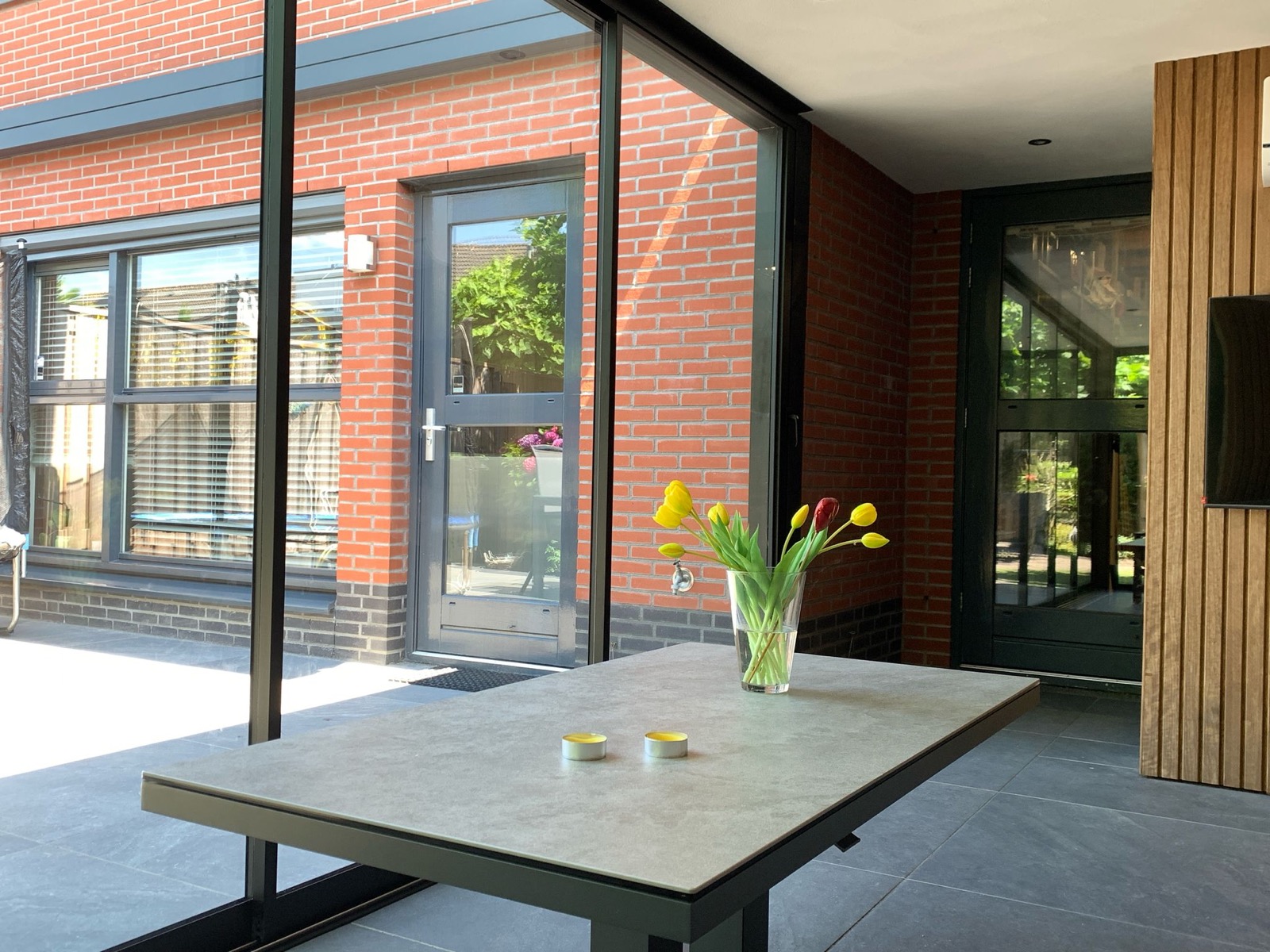luxe tuinkamer met vouwwanden van glas
