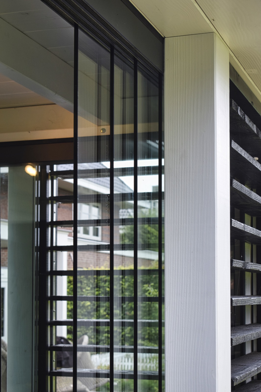 overkapping met glazen schuifwanden