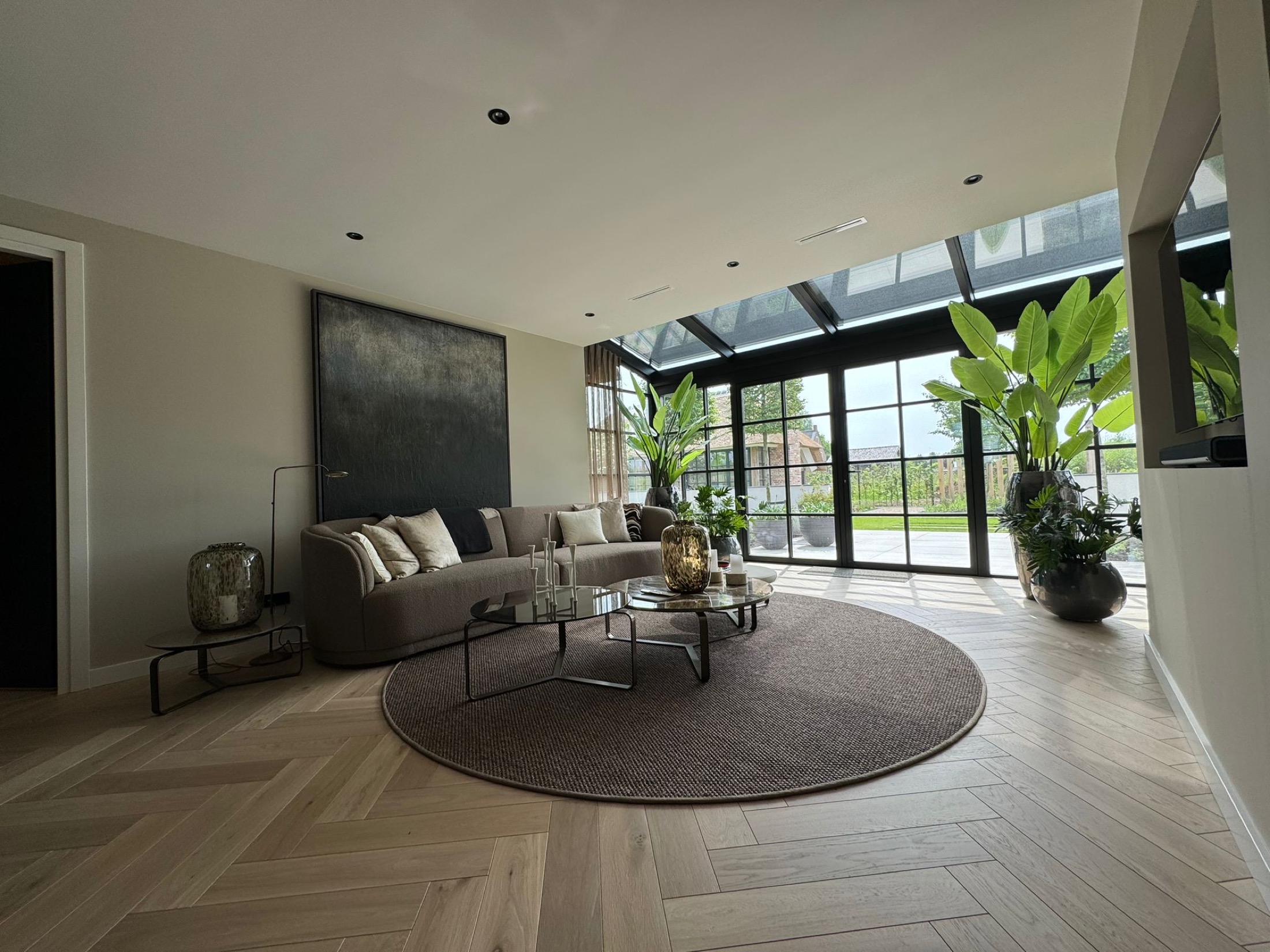 woonkamer inrichting met exclusieve kunst
